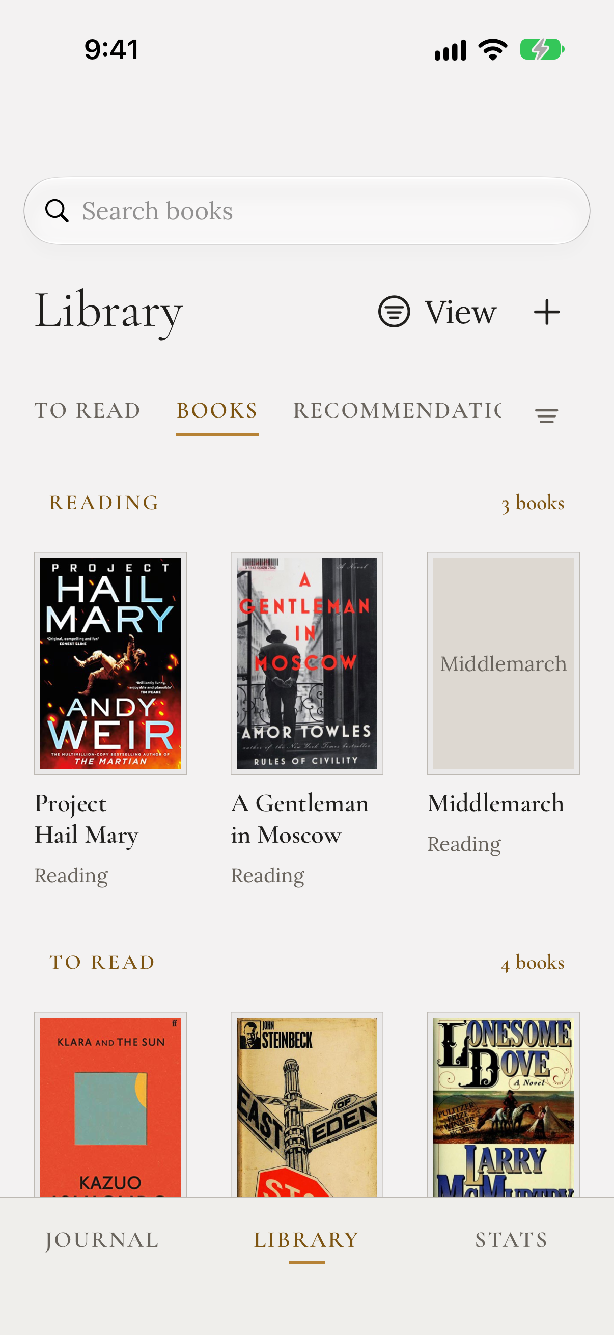 The Library books view, grouped into Reading, To Read, and Finished, with tabs and a filter control.